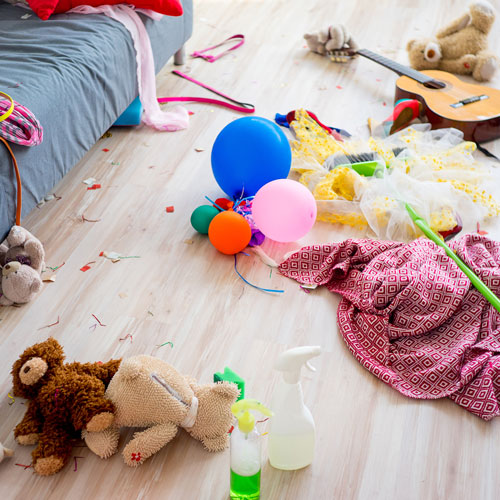 Kids toys laying on hardwood