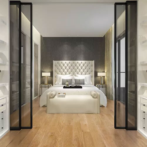 Wide plank hardwood flooring in bedroom