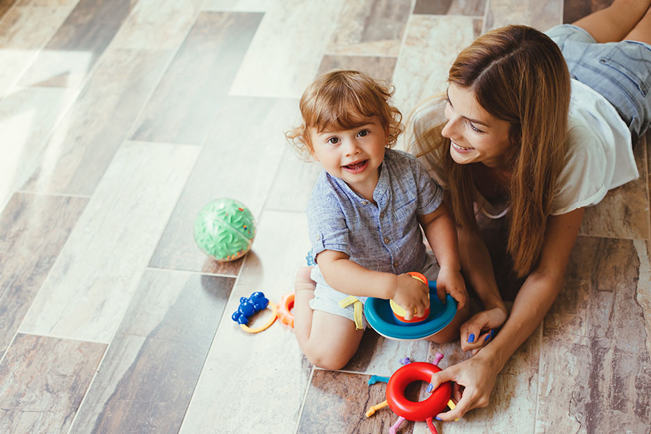 kid and mom enjoying new tile flooring