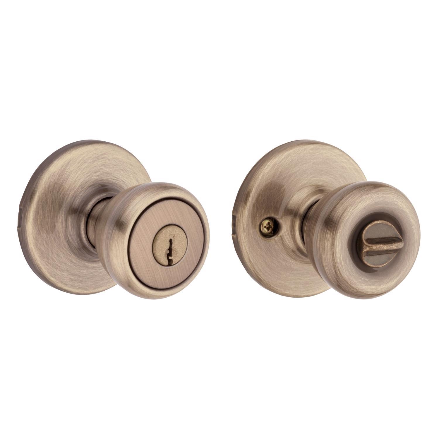 Kwikset Tylo Antique Brass Entry Door Knob 1-3/4 in.