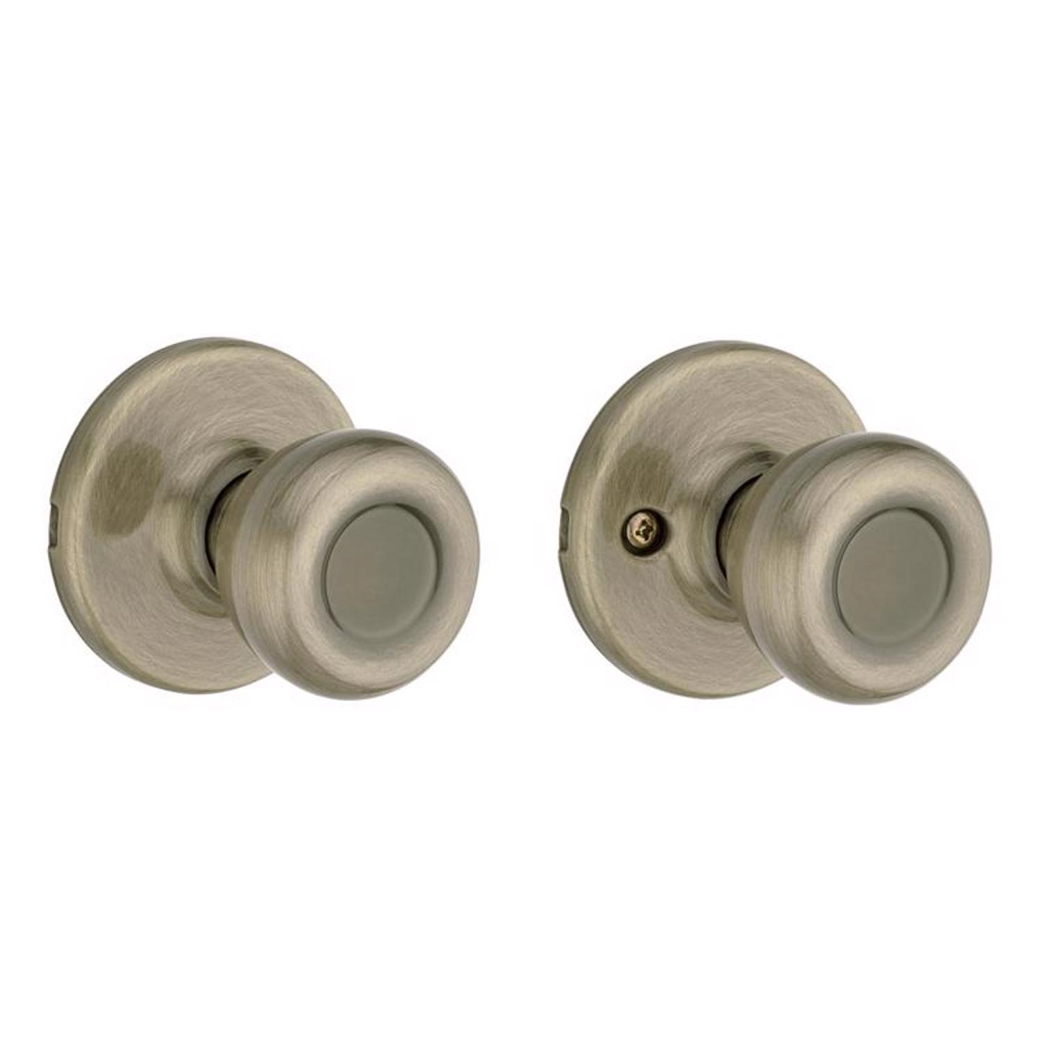 Kwikset Tylo Antique Brass Passage Door Knob
