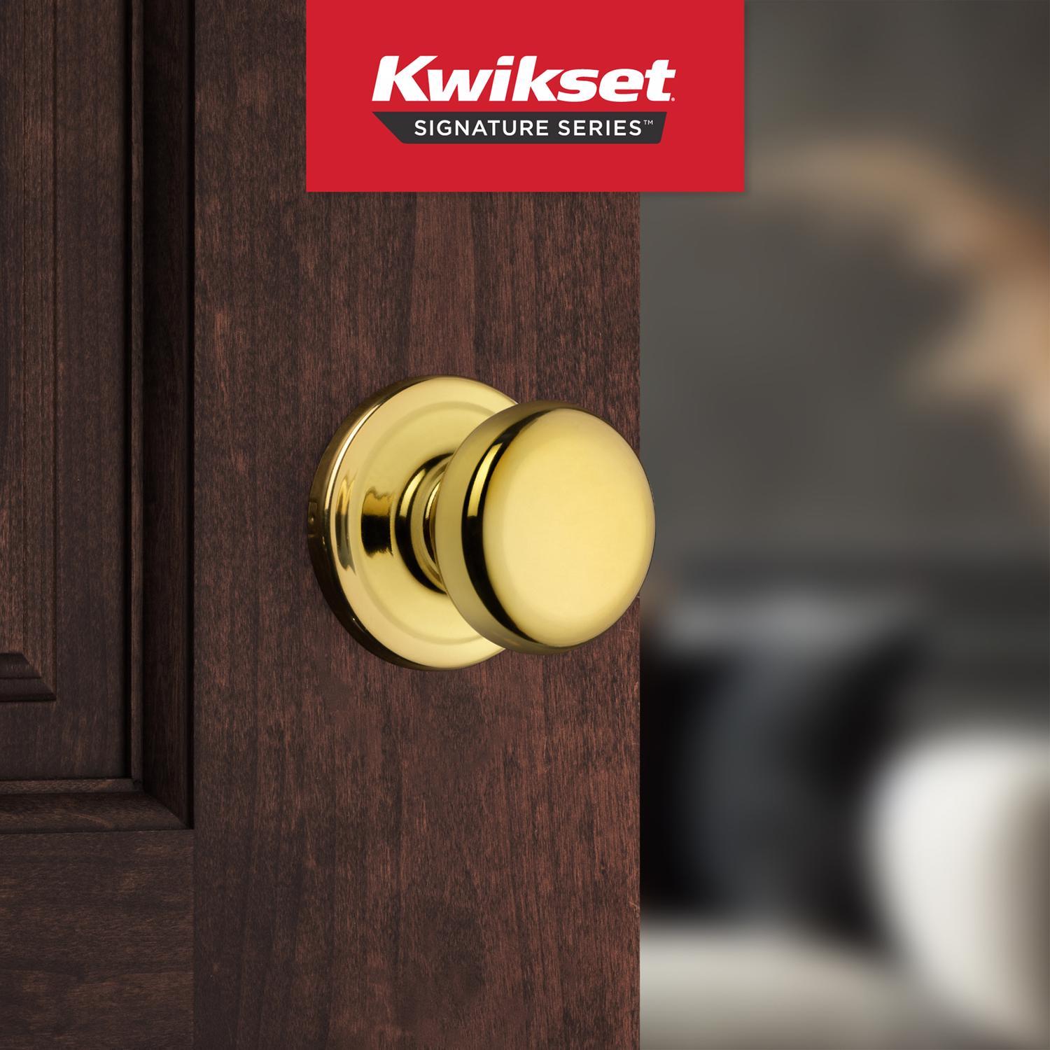 Kwikset Juno Polished Brass Passage Door Knob 1-3/4 in.