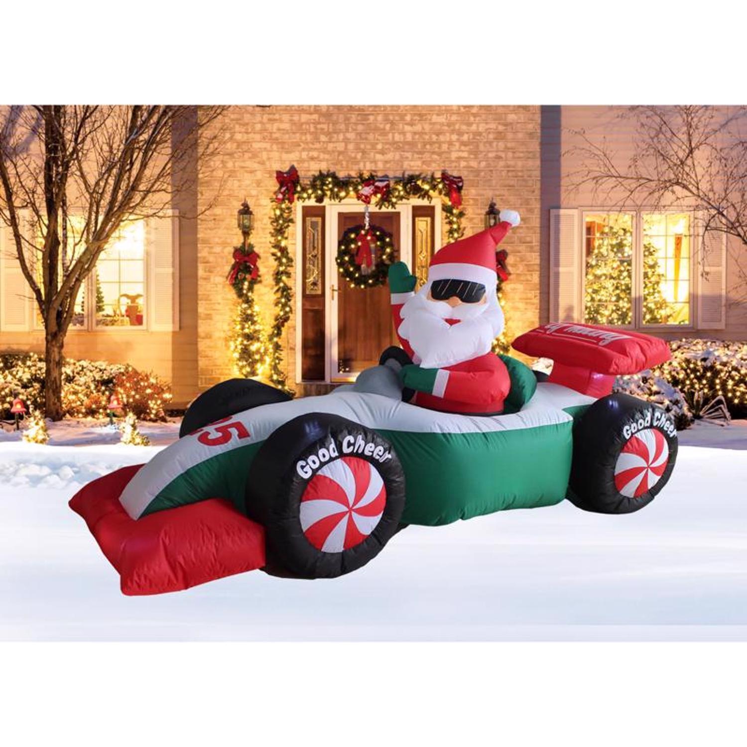 A Holiday Company LED Clear Santa with Race Car 4 ft. Inflatable