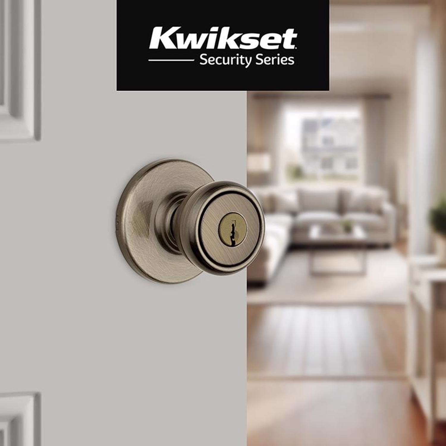 Kwikset Tylo Antique Brass Entry Door Knob 1-3/4 in.