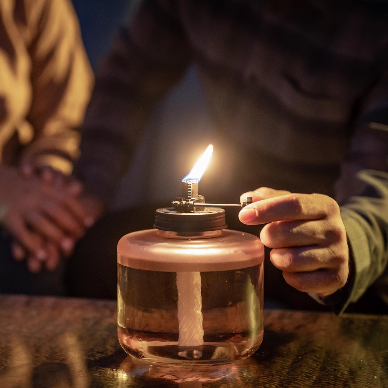 TIKI Adjustable Flame Pink Glass 6.5 in. Tabletop Torch 1 pc