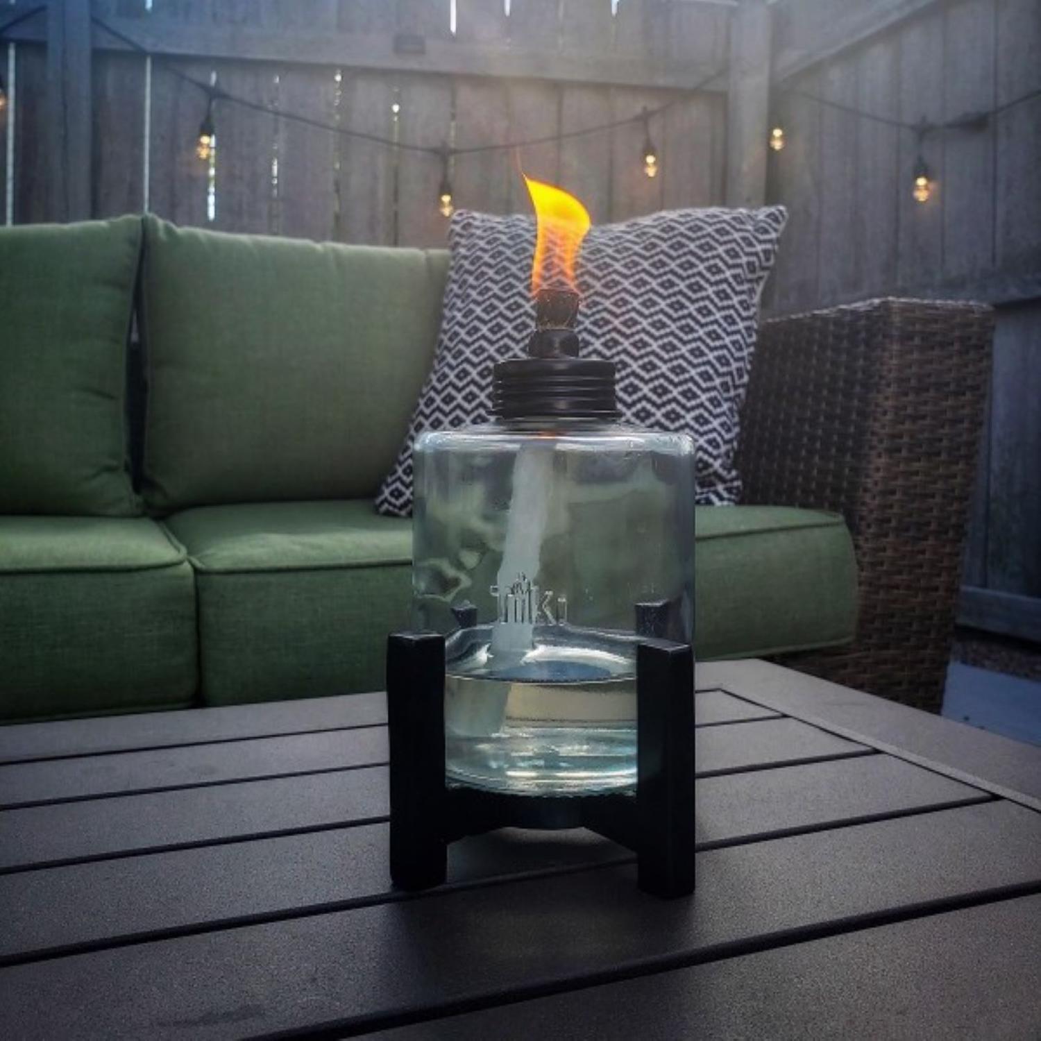 TIKI Black/Clear Glass/Metal 6.5 in. Elevated Tabletop Torch 1 pc