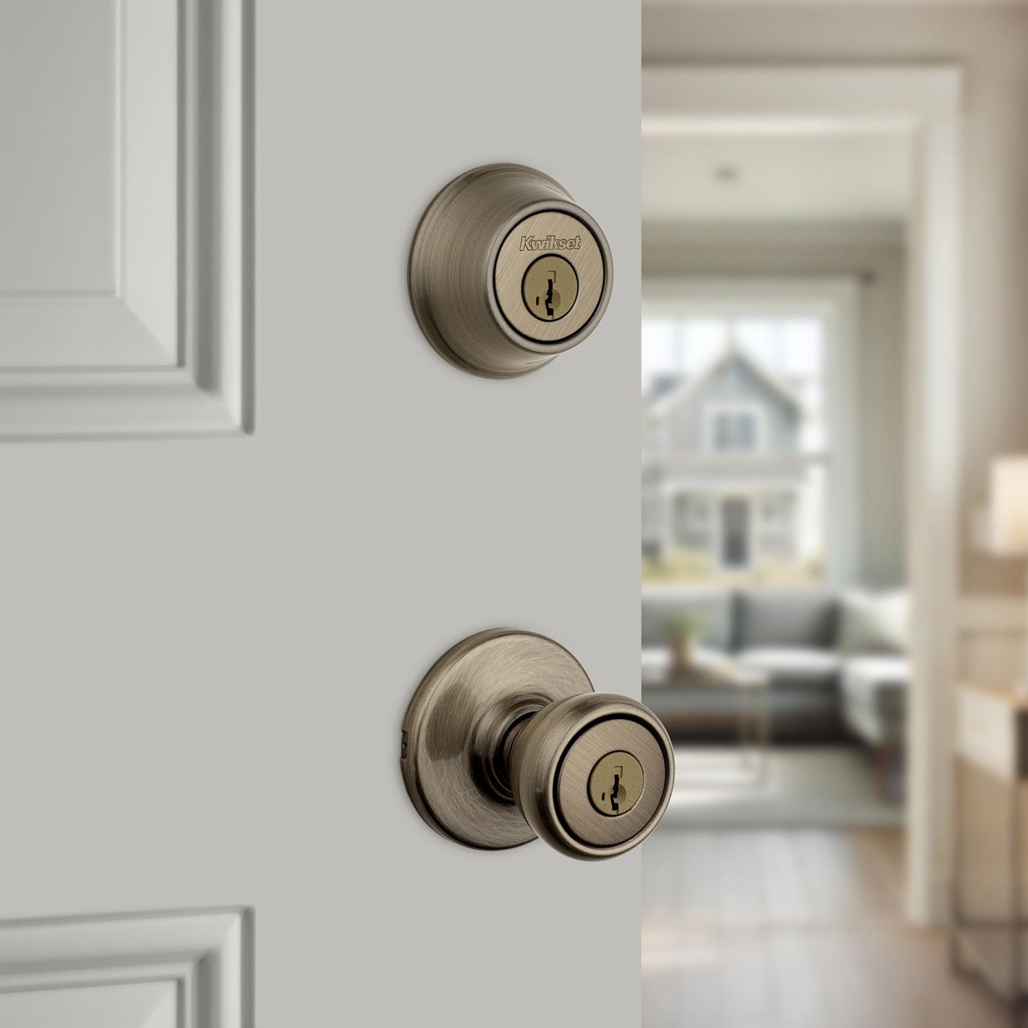 Kwikset Tylo Antique Brass Deadbolt and Passage Door Knob 1-3/4 in.