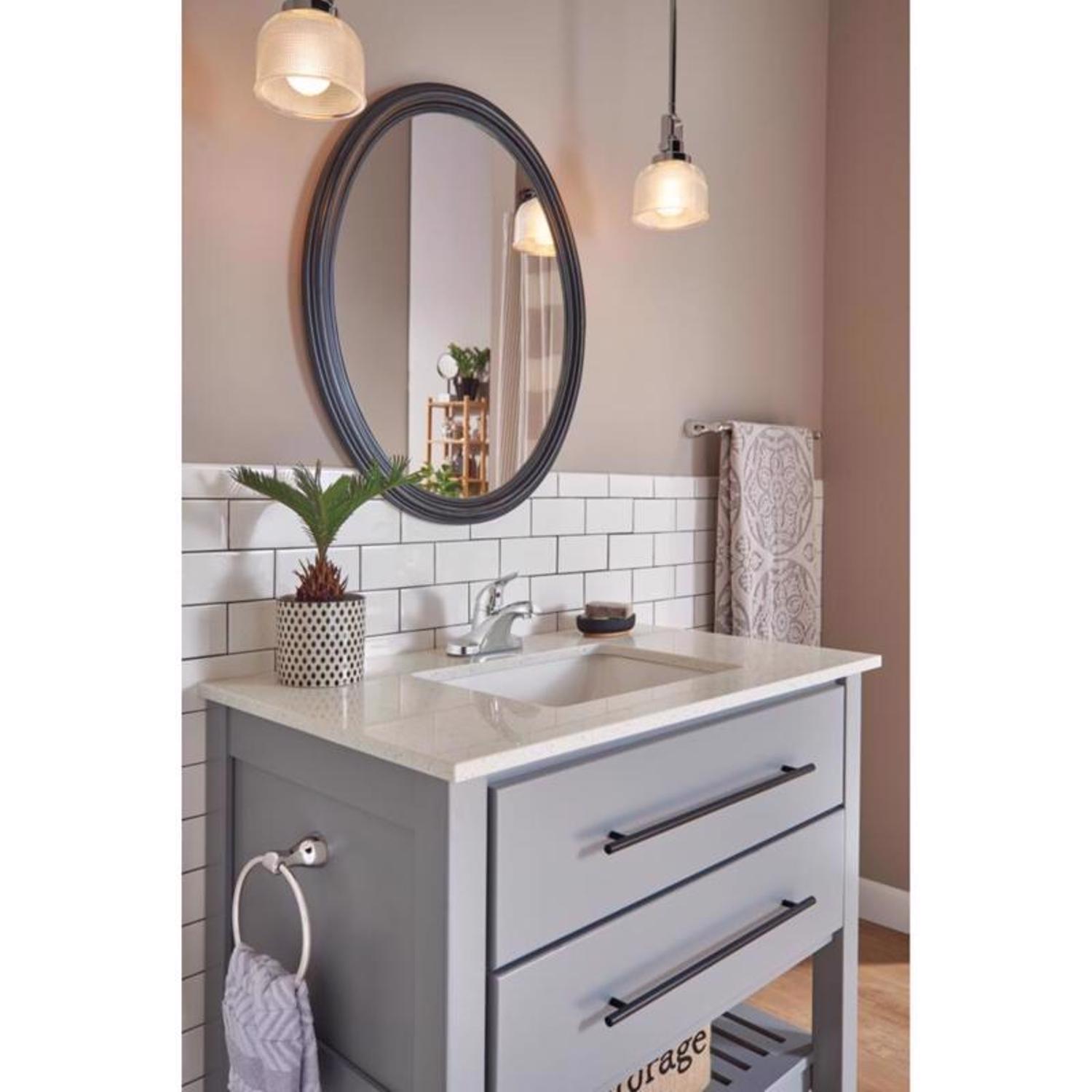 Delta Foundations Stainless Steel Pop-up Bathroom Sink Faucet 4 in.