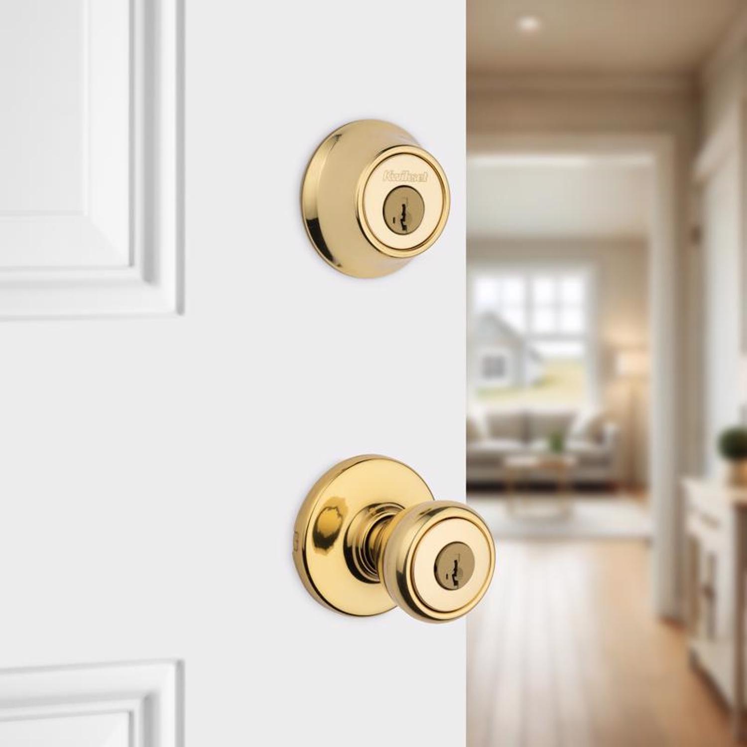 Kwikset Tylo Polished Brass Deadbolt and Passage Door Knob 1-3/4 in.