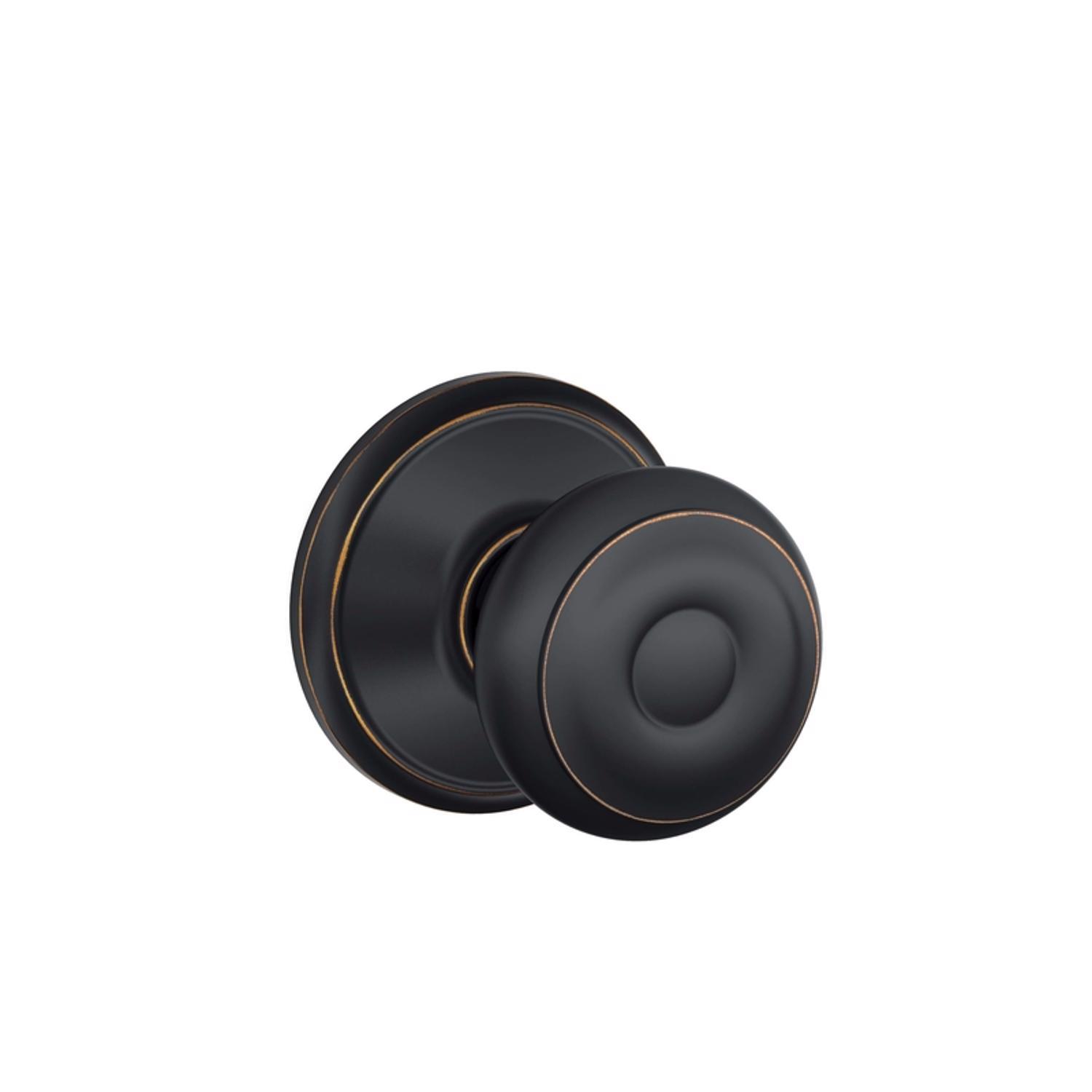 Schlage Georgian Aged Bronze Passage Door Knob 1-3/4 in.