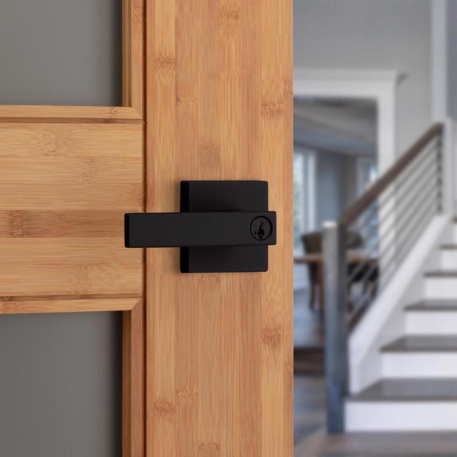 Kwikset Singapore Contemporary Matte Black Entry Door Knob 1-3/4 in.