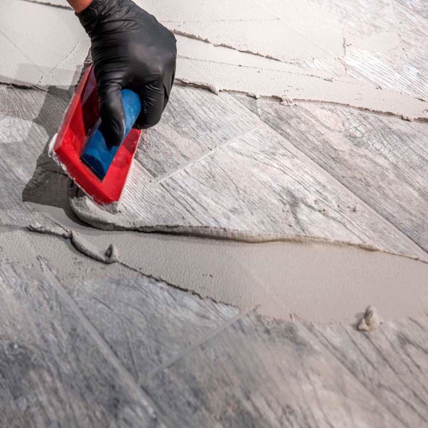 Custom Building Products Polyblend Plus Indoor and Outdoor Arctic White Sanded Grout 25 lb.